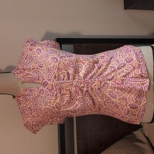 Beautiful Paisley purple, orange and cream colored.